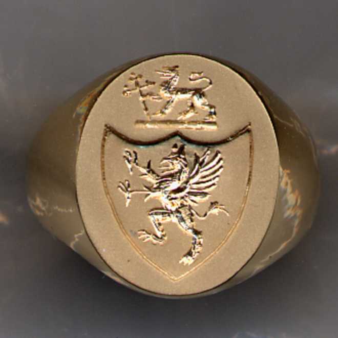 A man's gold Family Crest Ring.