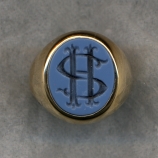A Ladies' Monogram Ring in Bicolor Agate.